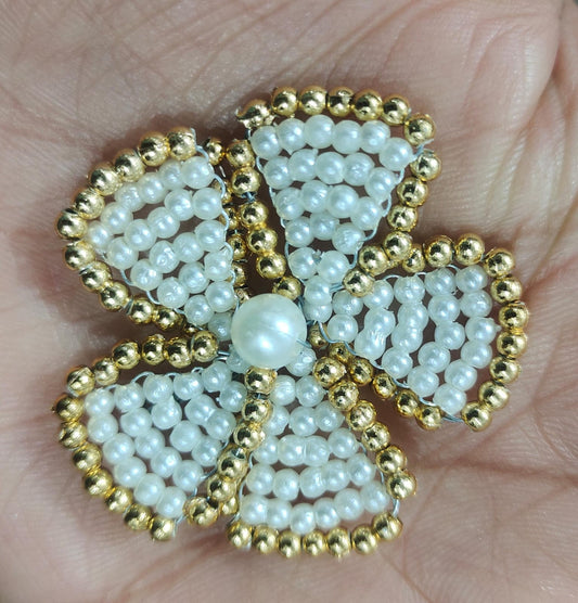 white and gold Beads flower