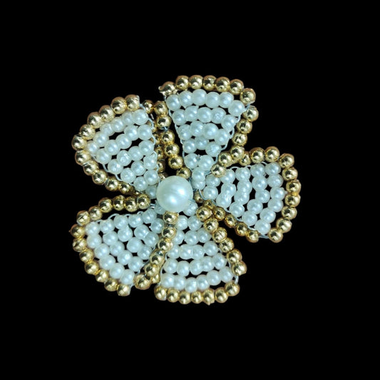 white and gold Beads flower